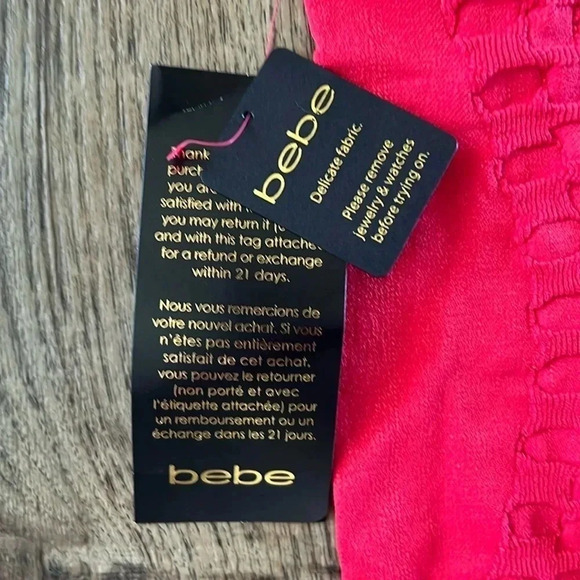 NWT Bebe Seamless Bodycon Textured Mini Dress Pink Size Small - Picture 7 of 9